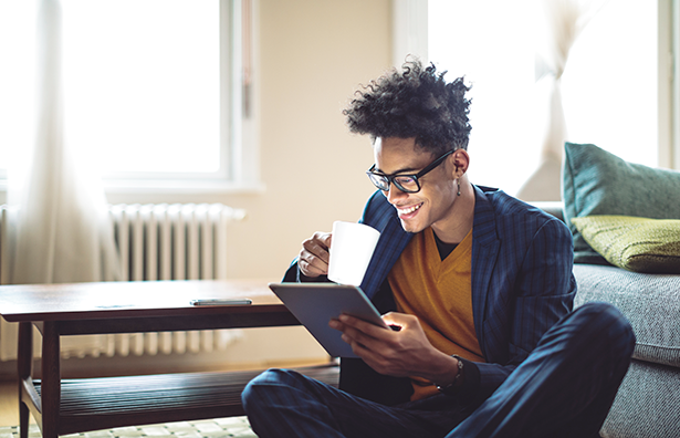 iStock-916567486 Customer smiling at the tablet